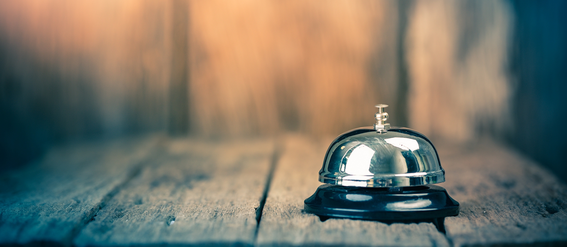 bell on wooden table